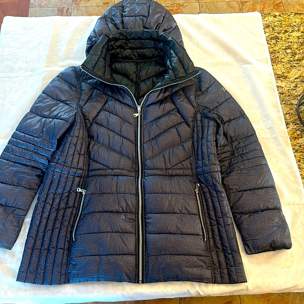 Women’s Guess coat, black with speckles of gray and the size is XXL